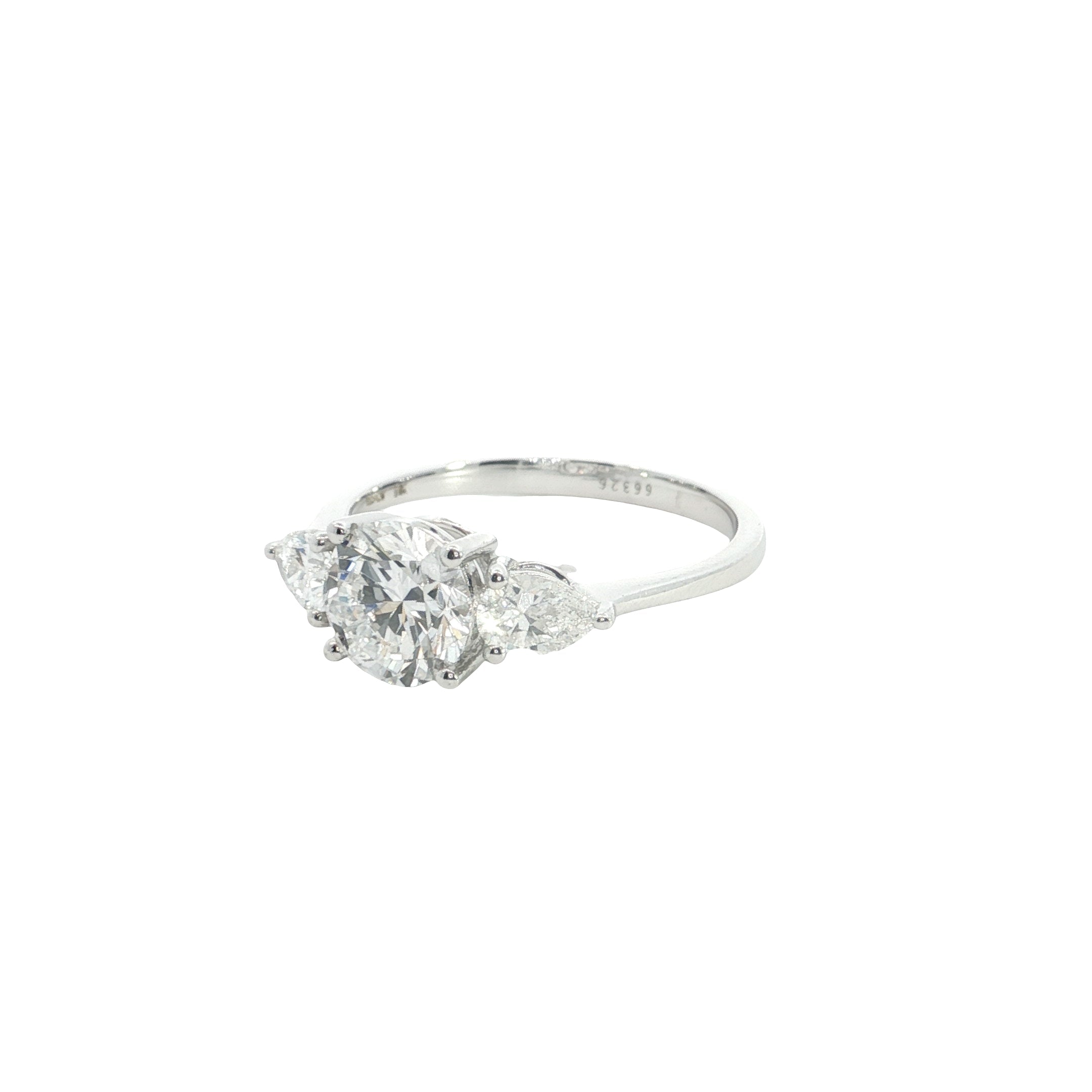 Round Brilliant cut with Pear Cut Lab grown Diamond Three Stone Engagement Ring