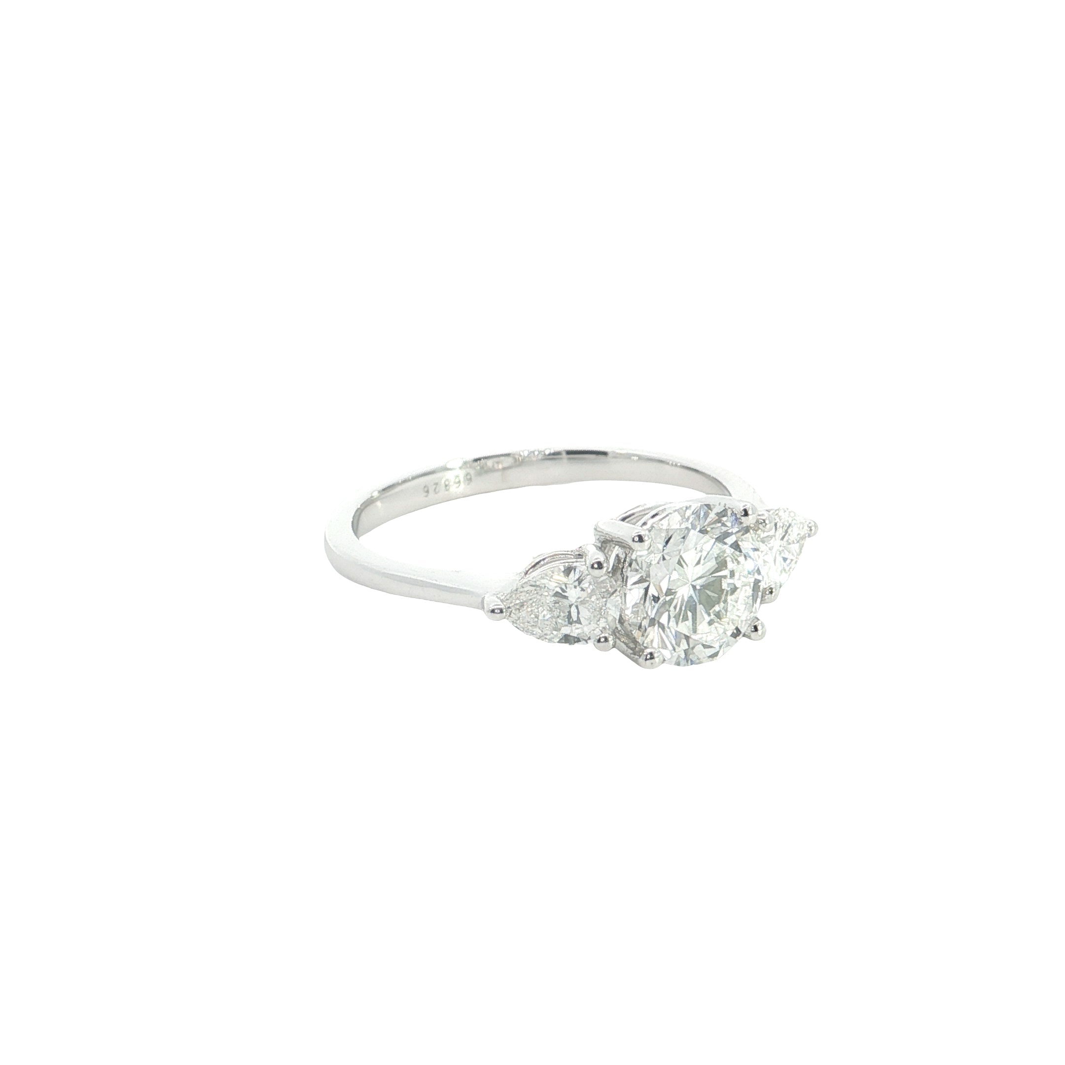 Round Brilliant cut with Pear Cut Lab grown Diamond Three Stone Engagement Ring