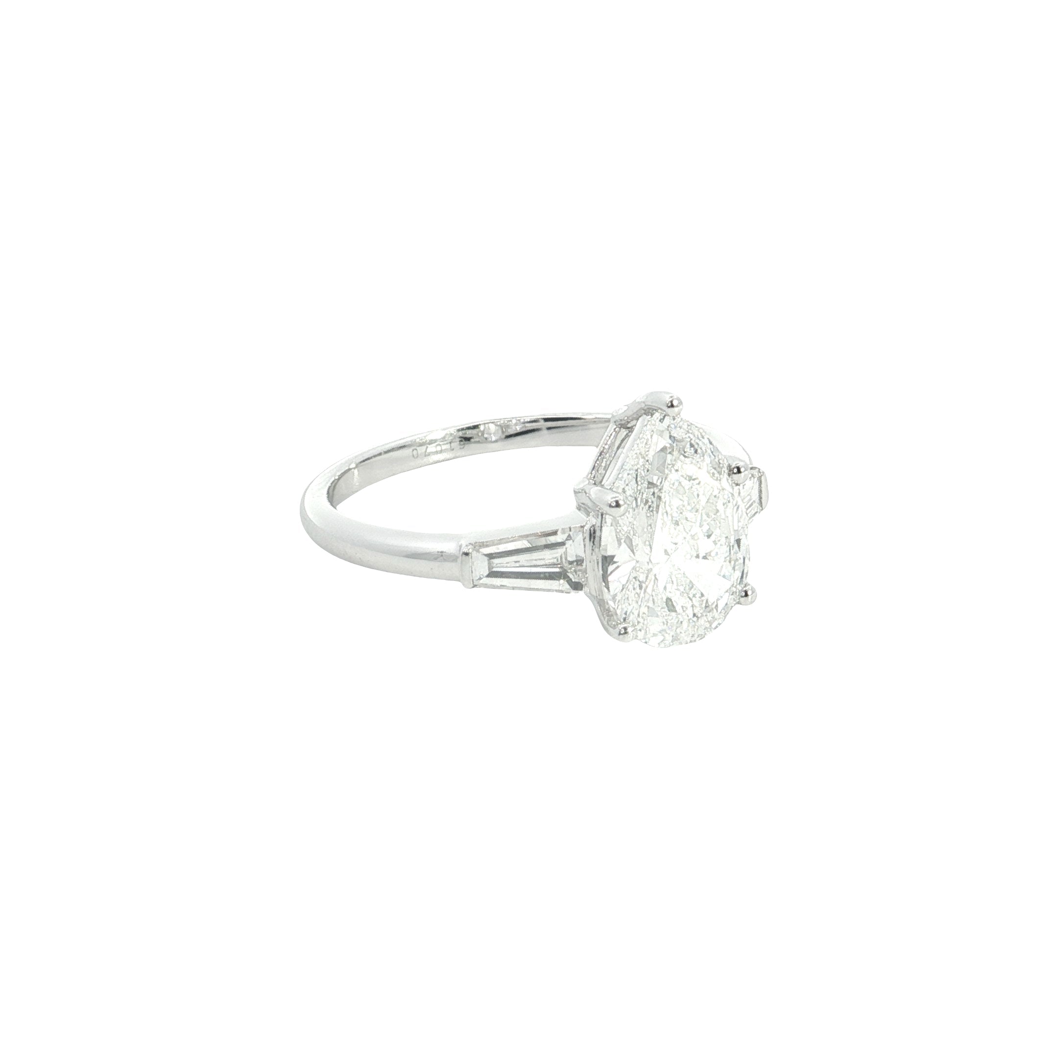 pear and tapered BAGUETTE diamond cut lab grown diamond engagement ring