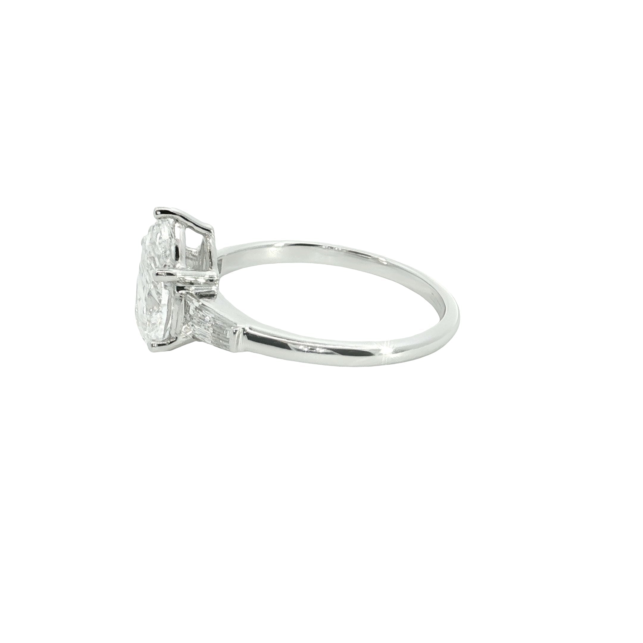 pear and tapered BAGUETTE diamond cut lab grown diamond engagement ring