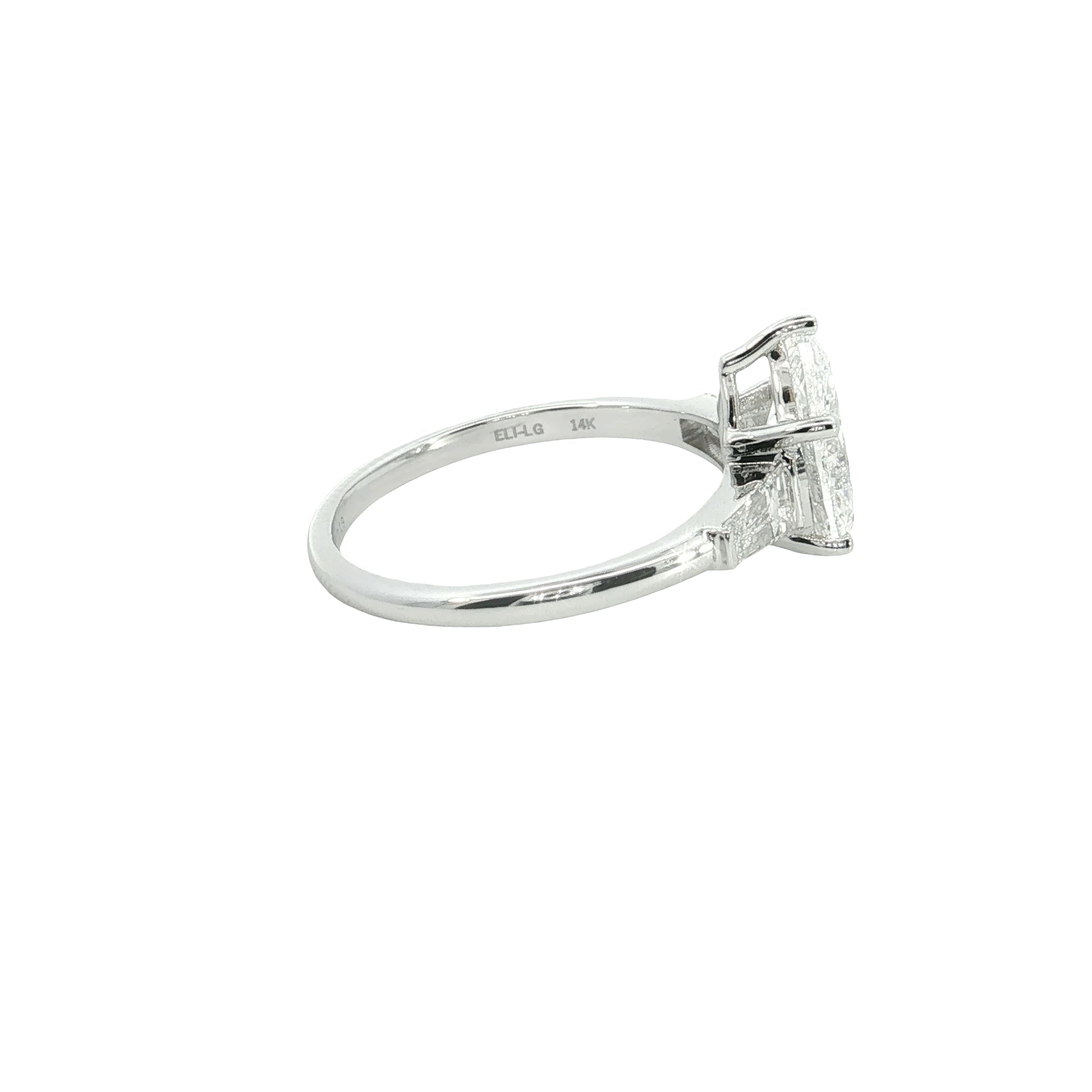 pear and tapered BAGUETTE diamond cut lab grown diamond engagement ring