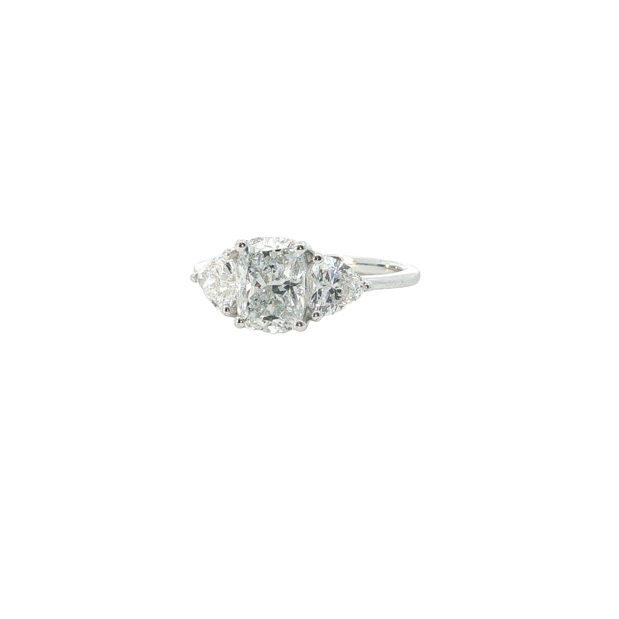 lab elongated cushion with heart shape lab grown diamond three stone engagement ring