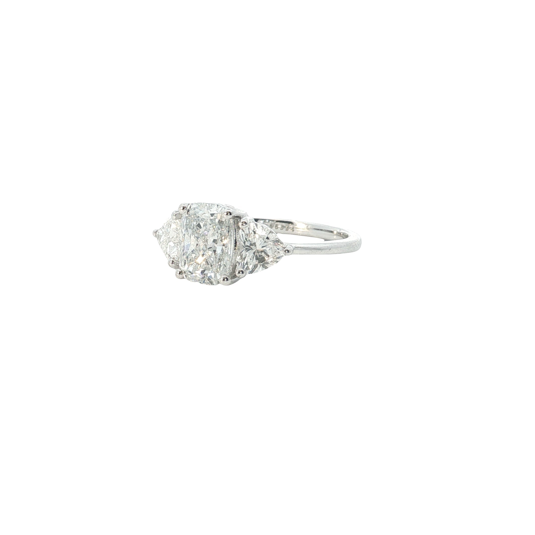 lab elongated cushion with heart shape lab grown diamond three stone engagement ring