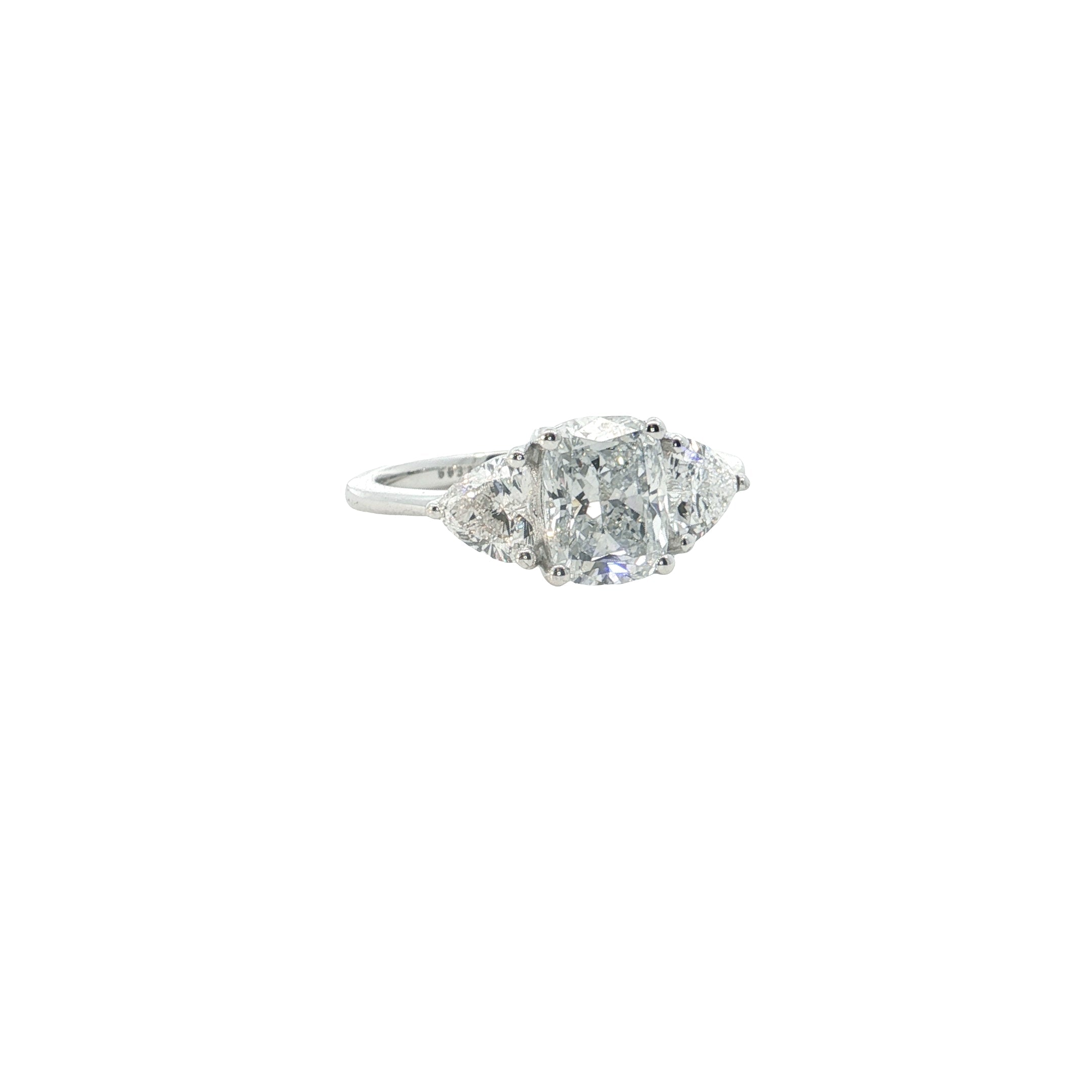lab elongated cushion with heart shape lab grown diamond three stone engagement ring