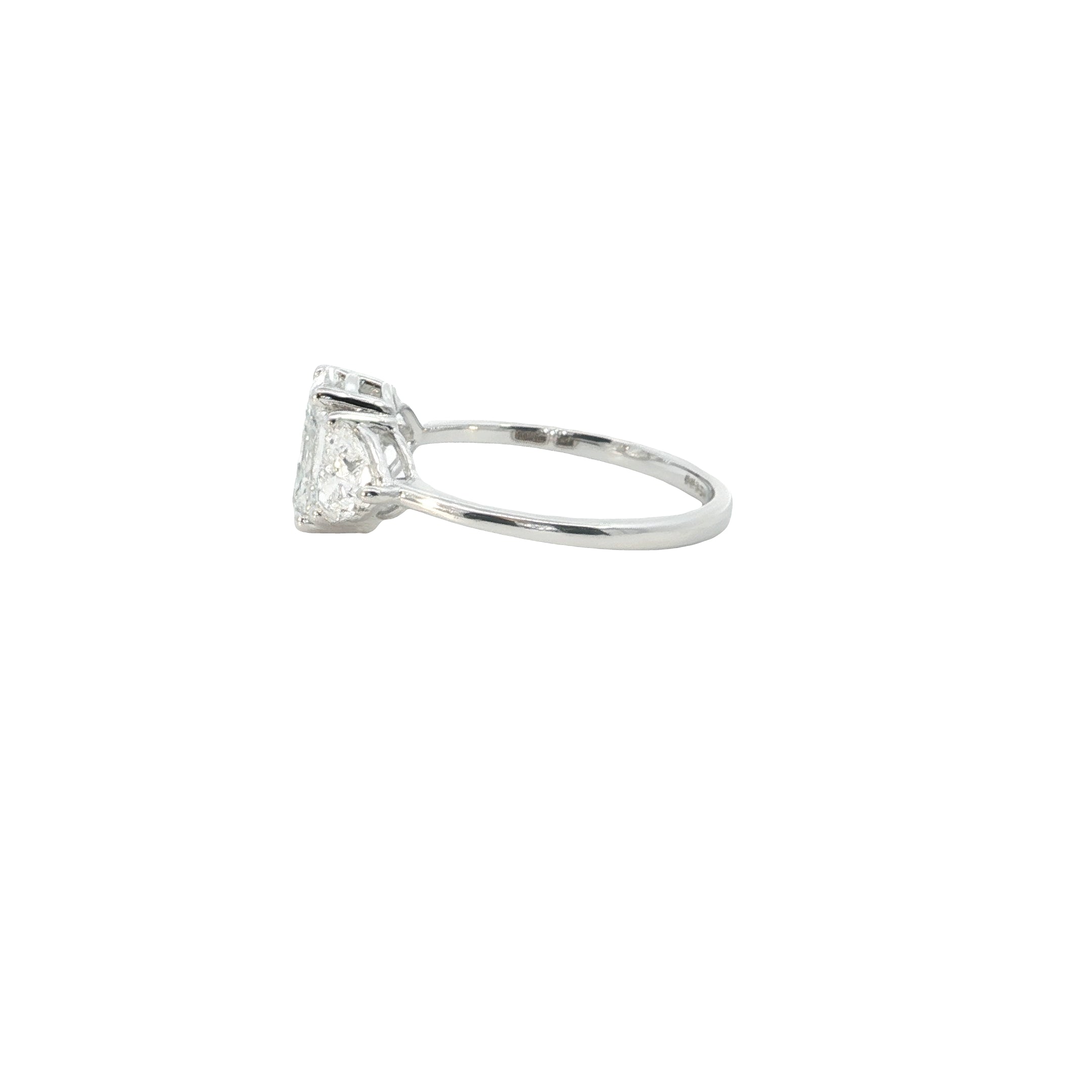 lab elongated cushion with heart shape lab grown diamond three stone engagement ring