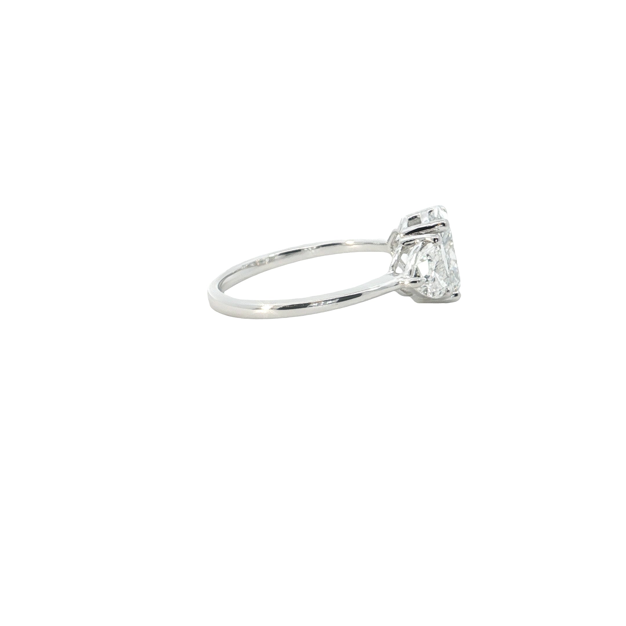 lab elongated cushion with heart shape lab grown diamond three stone engagement ring