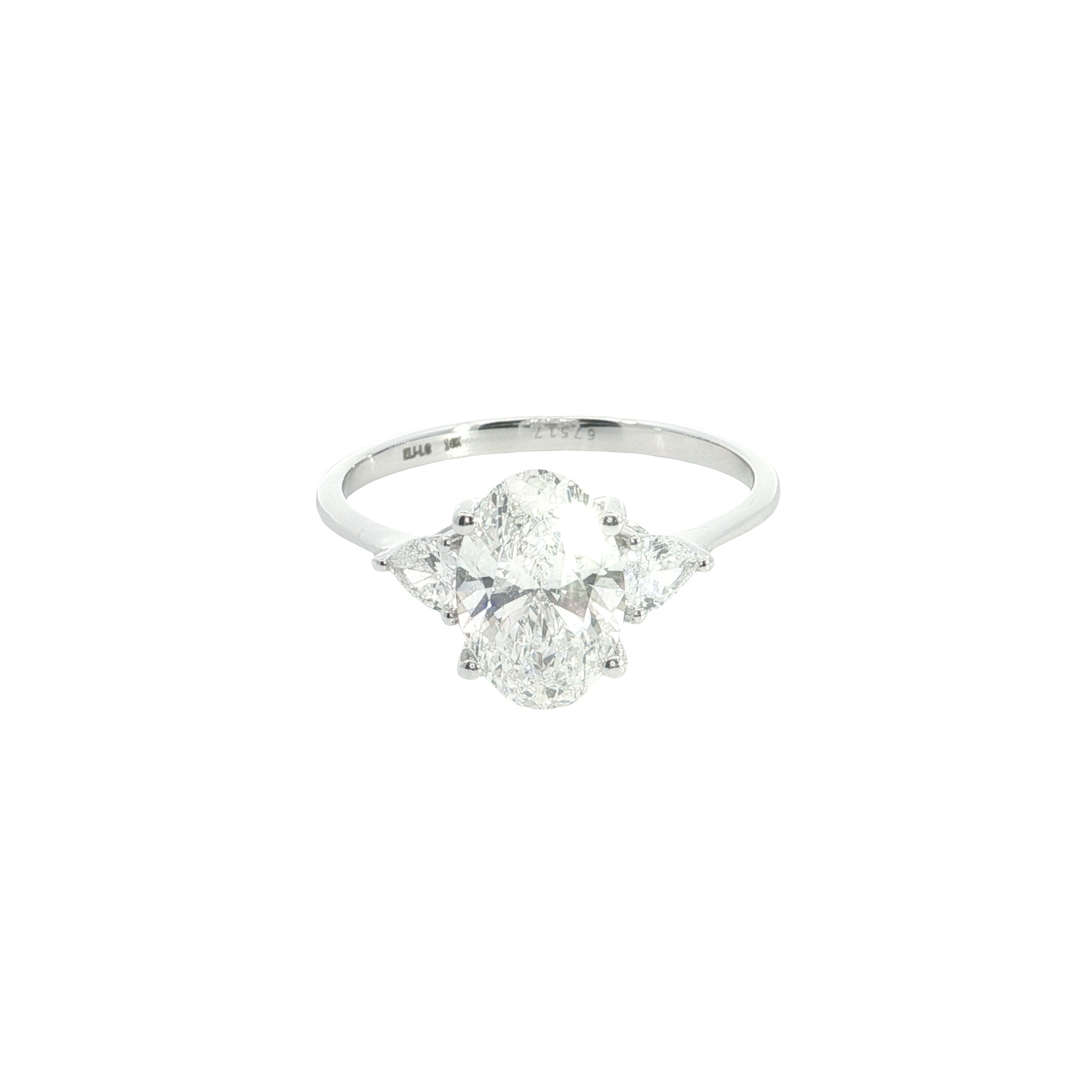 Oval with pear Cut Lab grown Diamond three stone engagement ring