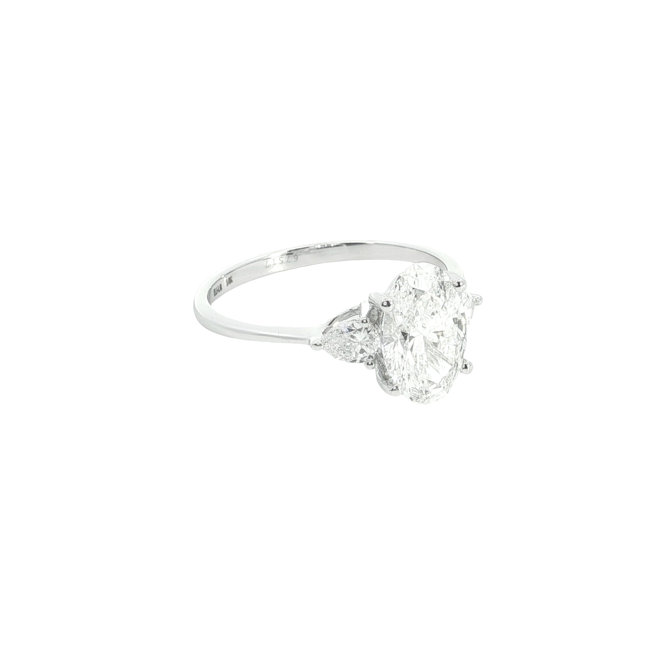 Oval with pear Cut Lab grown Diamond three stone engagement ring