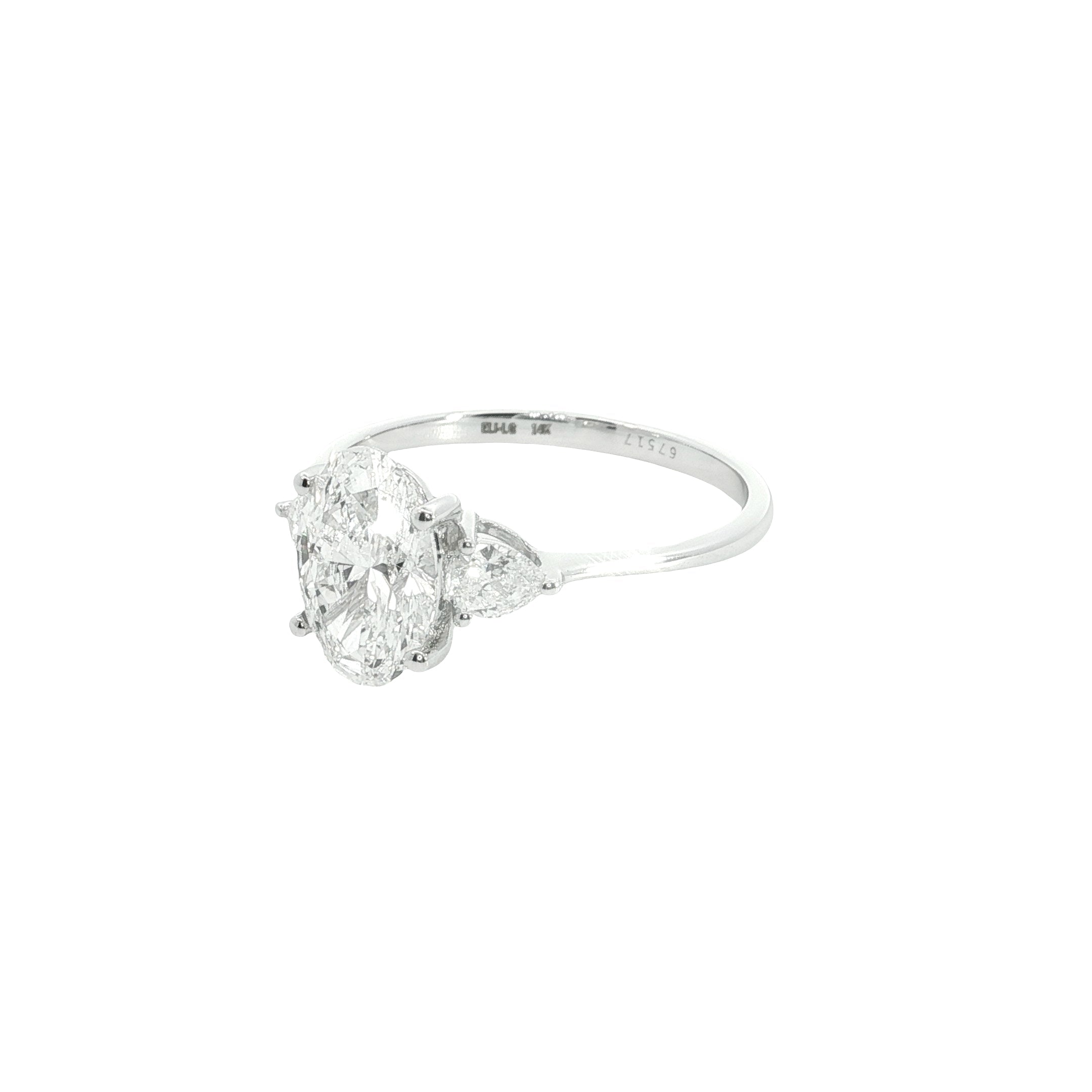 Oval with pear Cut Lab grown Diamond three stone engagement ring