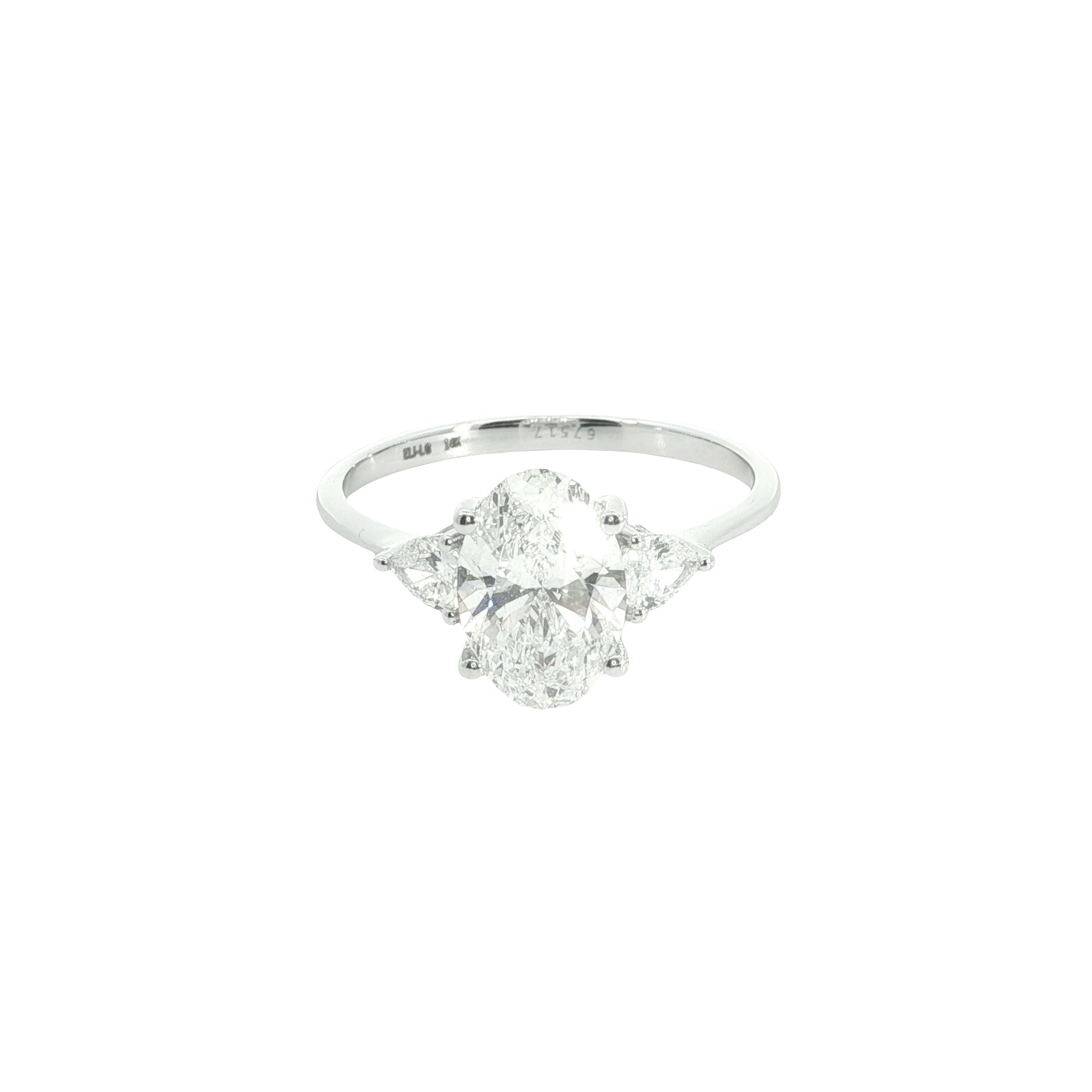 Oval with pear Cut Lab grown Diamond three stone engagement ring