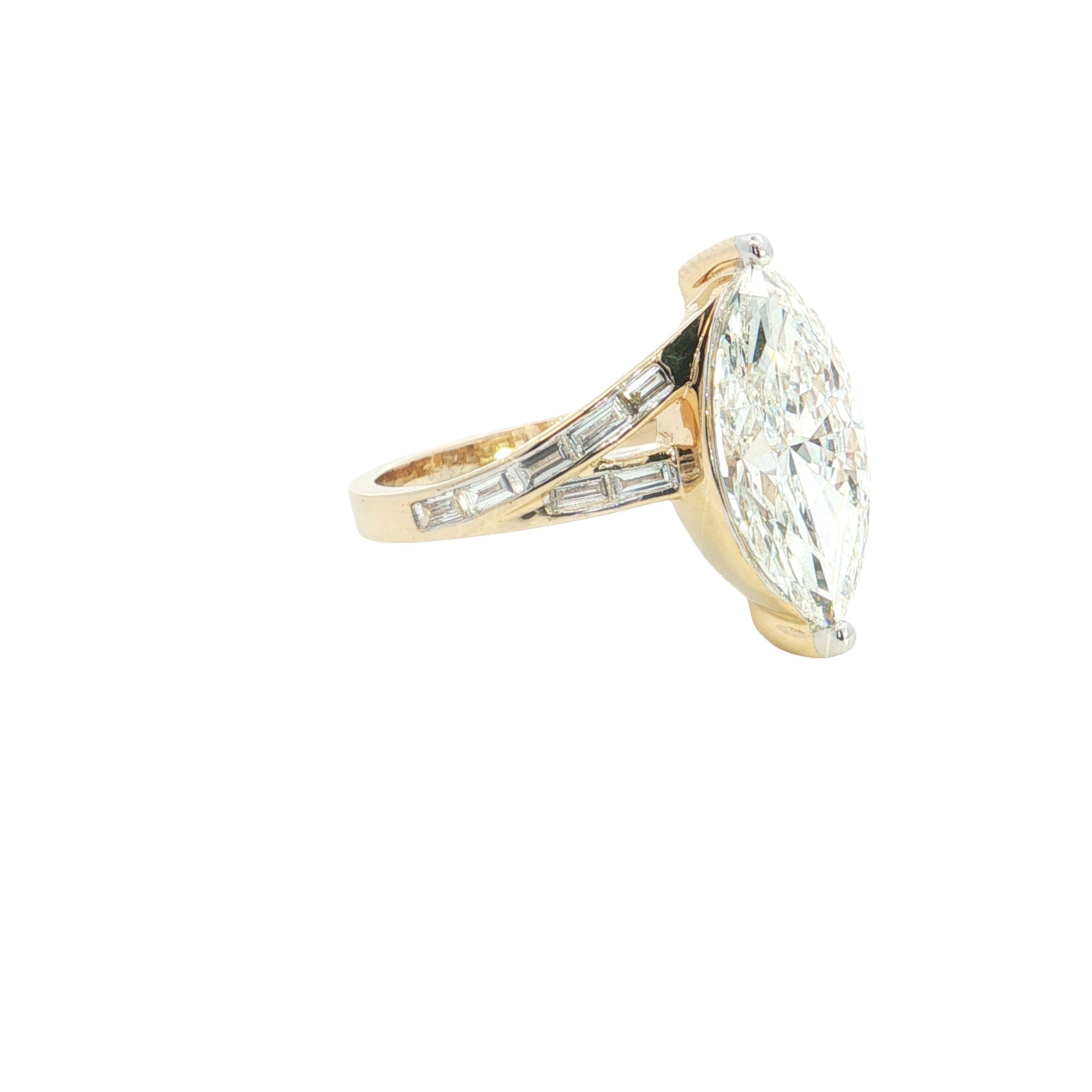 marquise center with BAGUETTE  and round lab grown diamond engagement ring