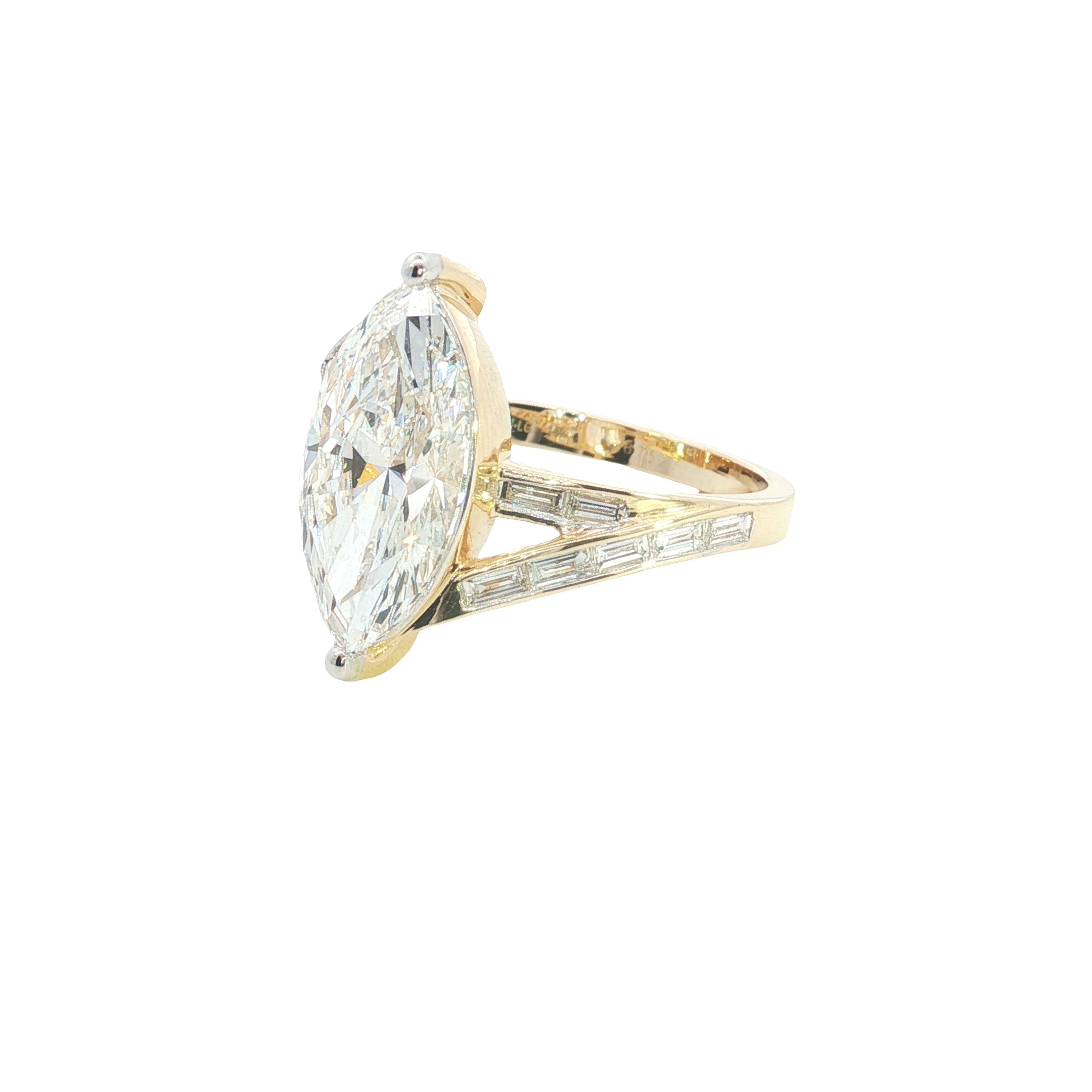 marquise center with BAGUETTE  and round lab grown diamond engagement ring