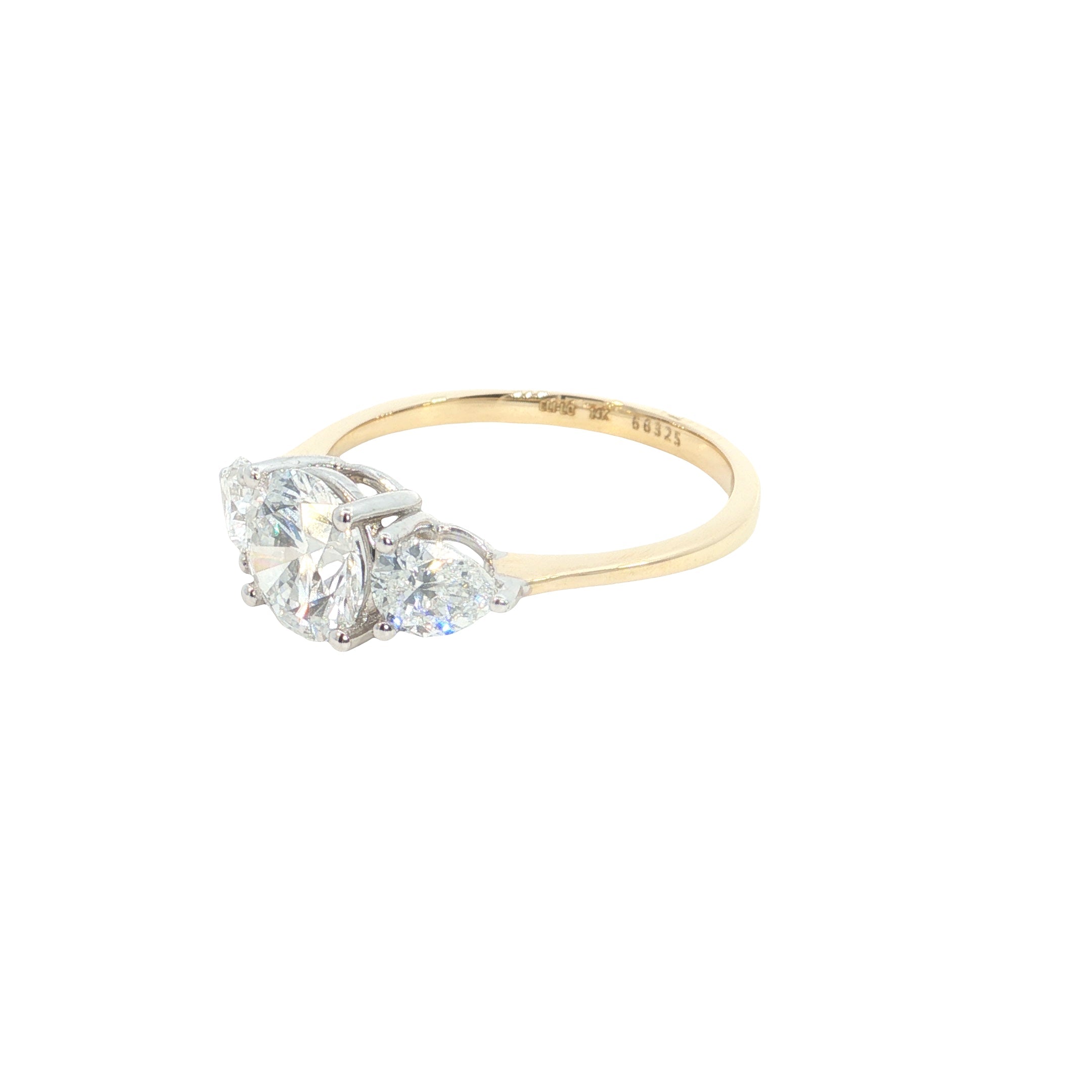Round Brilliant cut with Pear Cut Lab grown Diamond Three Stone Engagement Ring