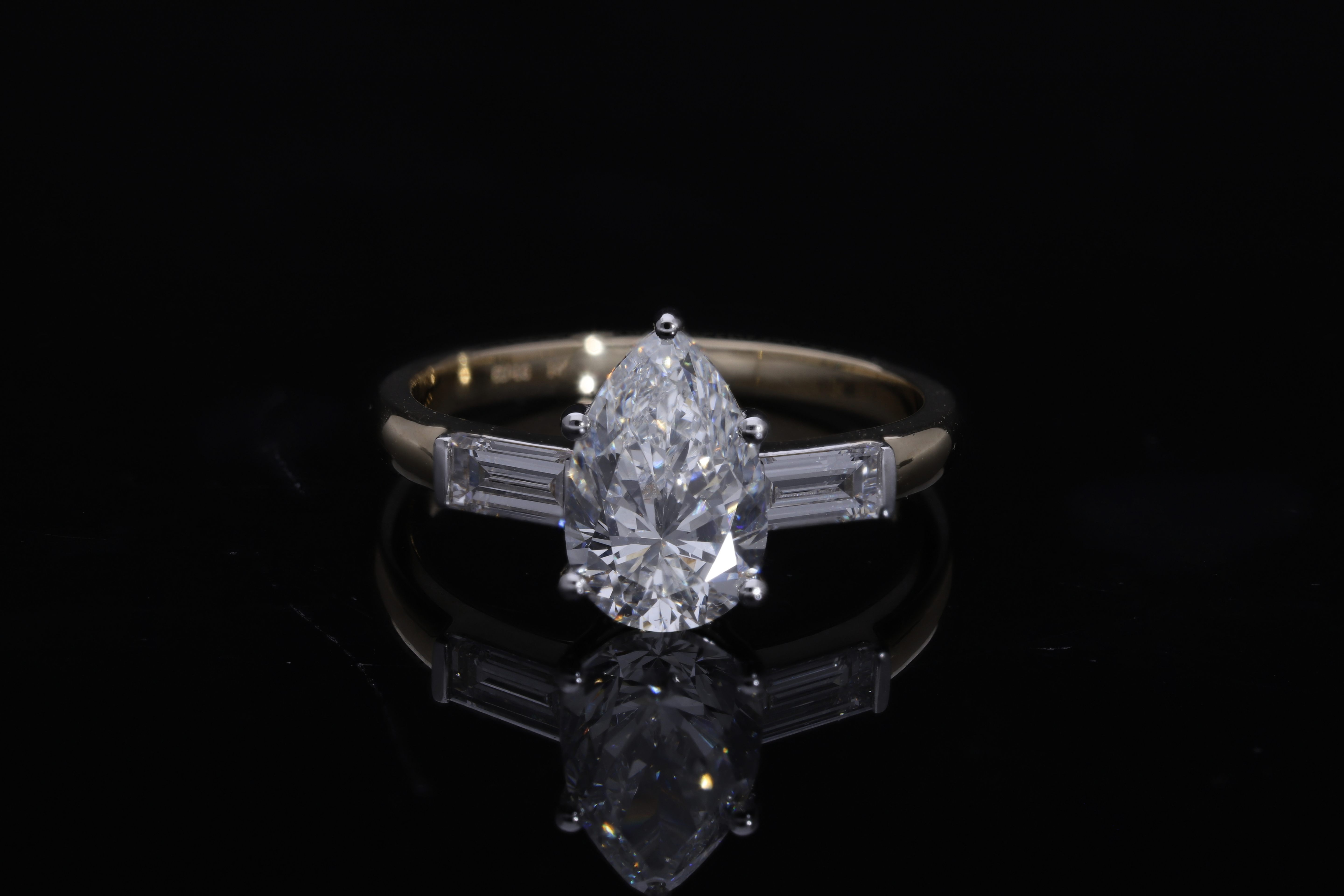 pear and tapered BAGUETTE diamond cut lab grown diamond engagement ring