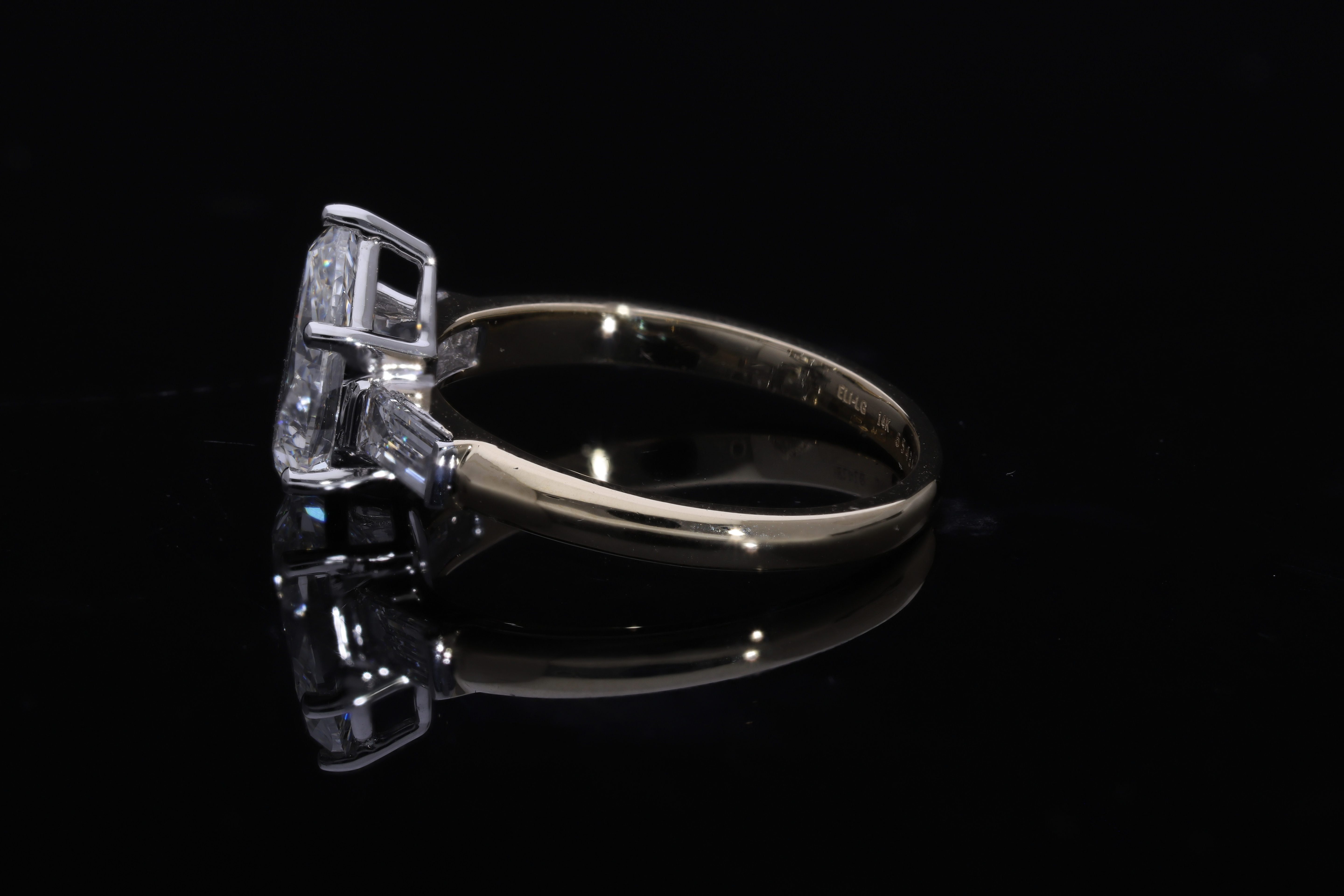 pear and tapered BAGUETTE diamond cut lab grown diamond engagement ring