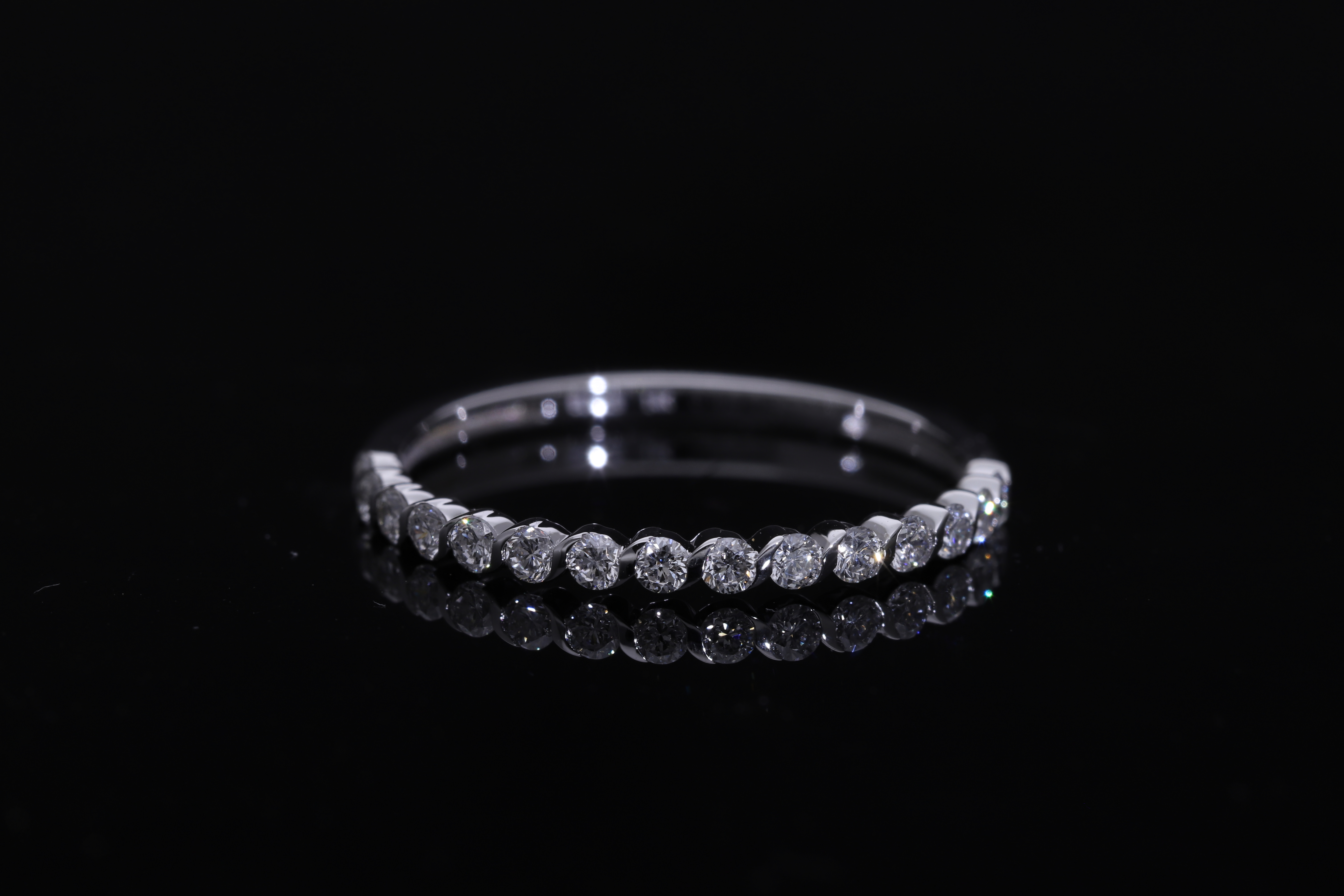 Round Brilliant Cut Lab grown Diamond with Bezel set Eternity Band