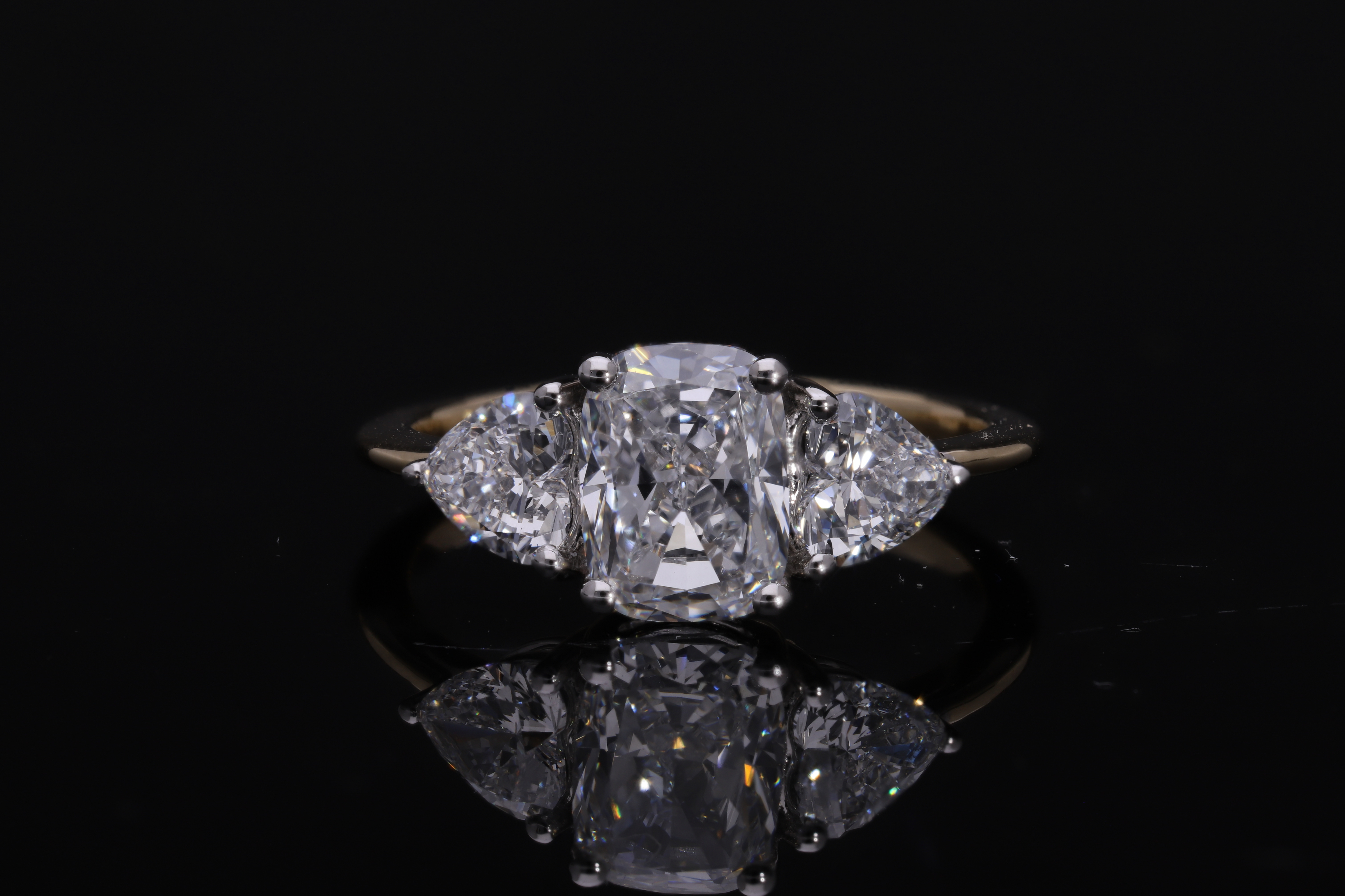 lab elongated cushion with heart shape lab grown diamond three stone engagement ring