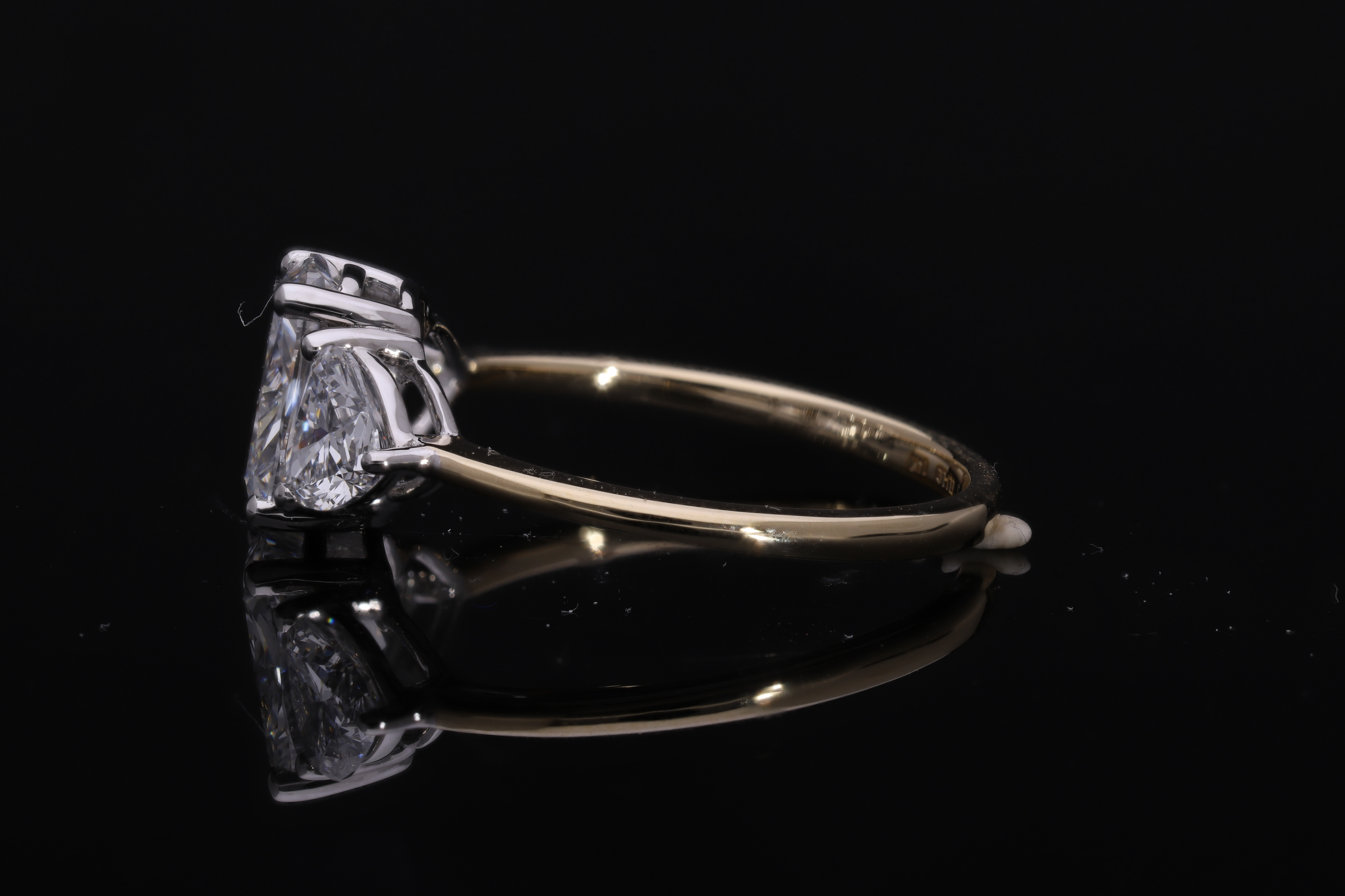 lab elongated cushion with heart shape lab grown diamond three stone engagement ring