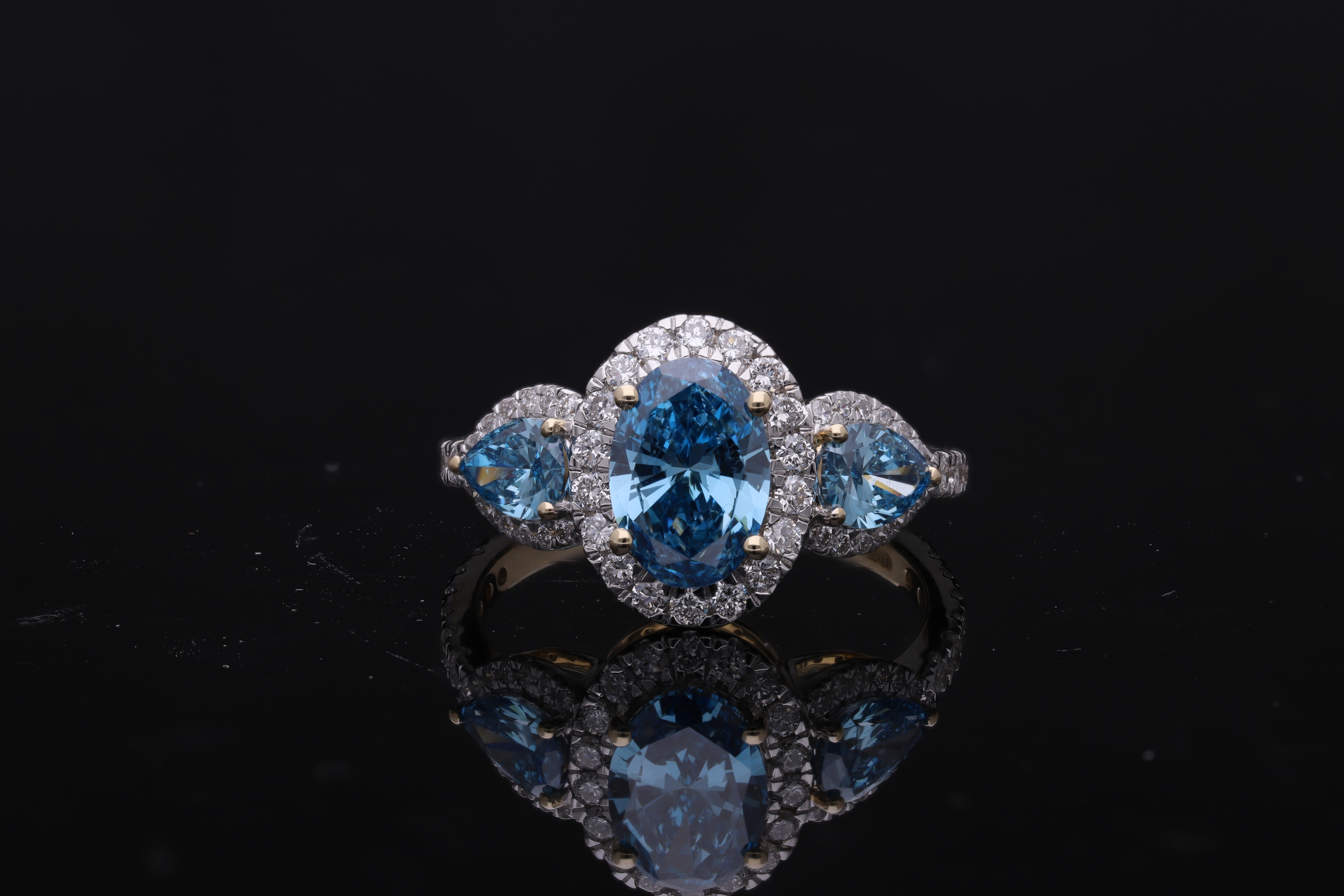 Blue color lab grown Oval and Pear with Brilliant cut Diamond Halo Engagement Ring