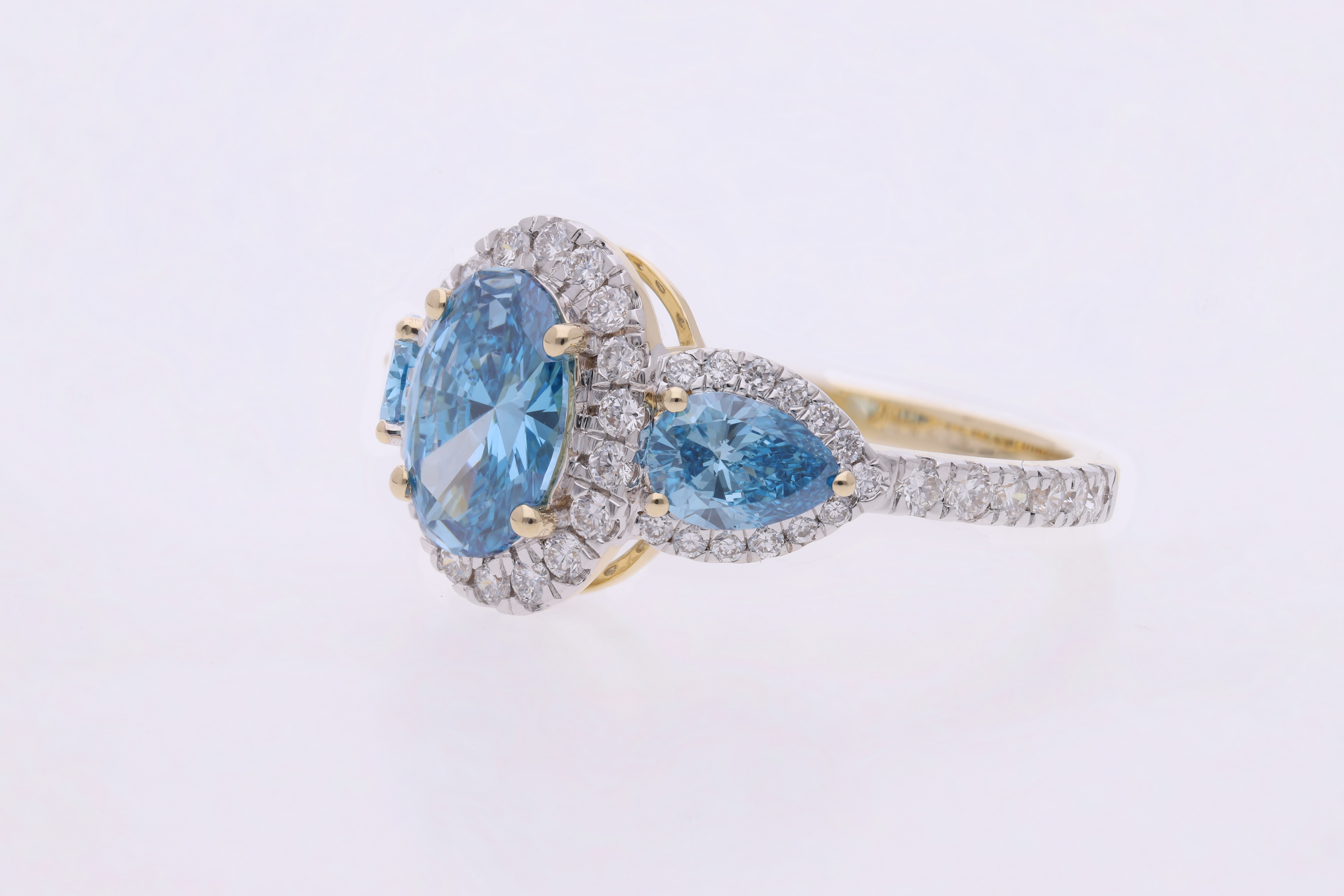 Blue color lab grown Oval and Pear with Brilliant cut Diamond Halo Engagement Ring