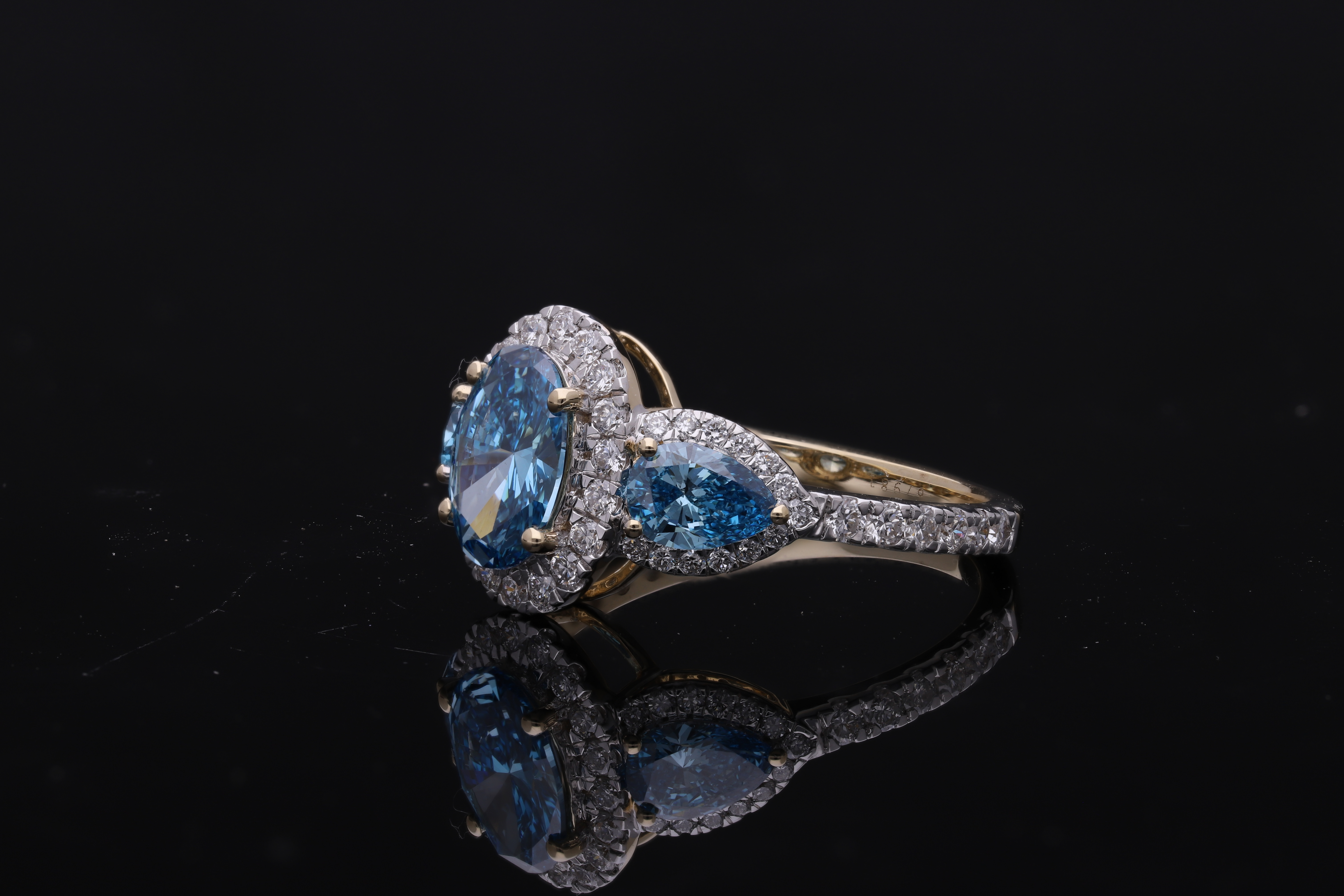 Blue color lab grown Oval and Pear with Brilliant cut Diamond Halo Engagement Ring