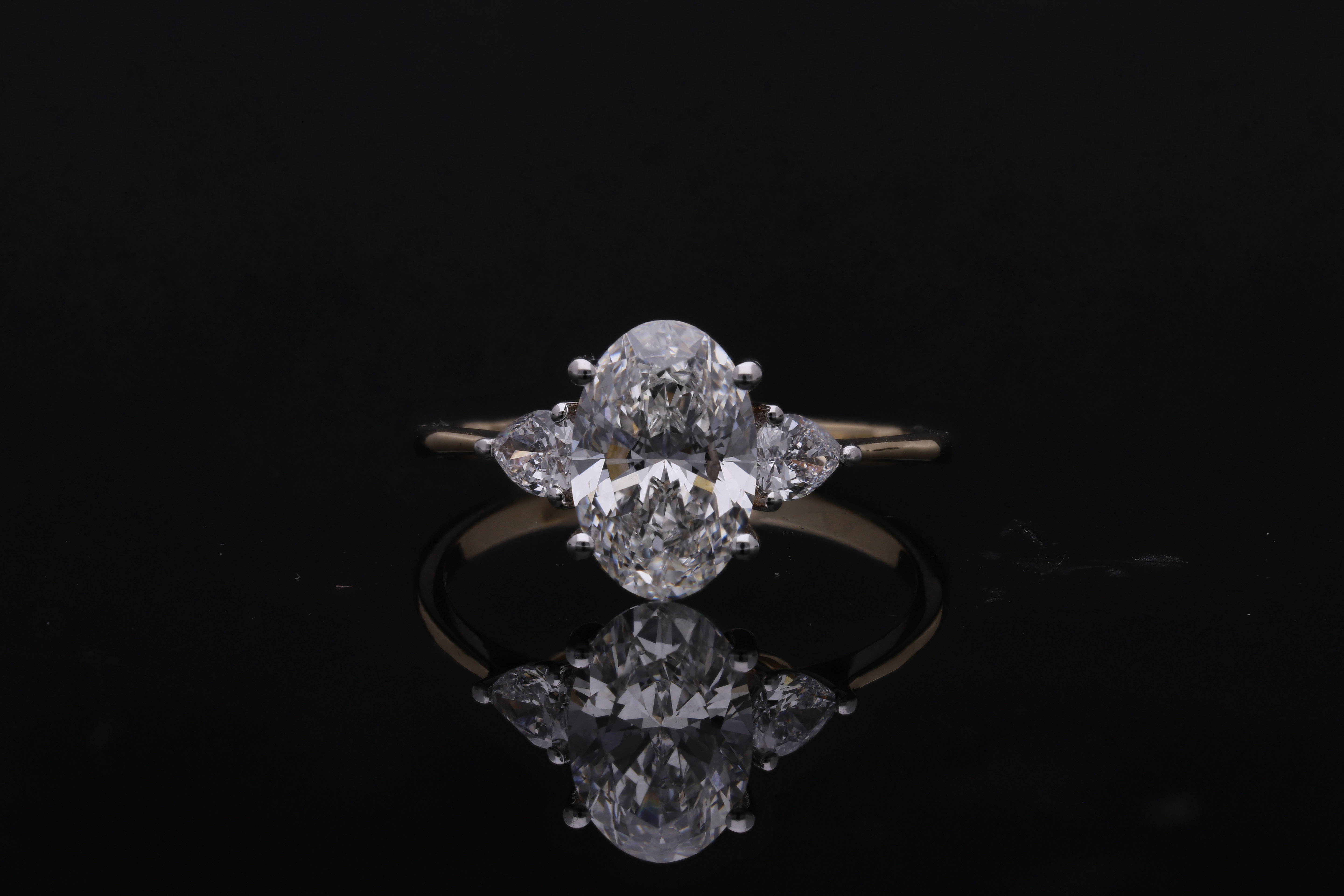 Oval with pear Cut Lab grown Diamond three stone engagement ring