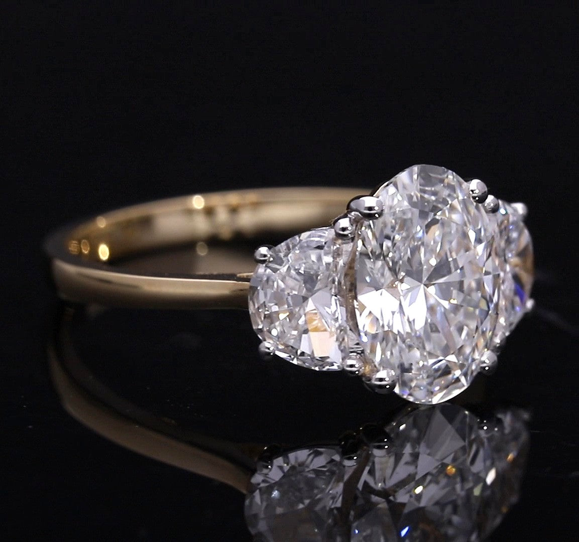 Oval and Half-Moon Cut Lab-Grown Diamond Three-Stone Engagement Ring