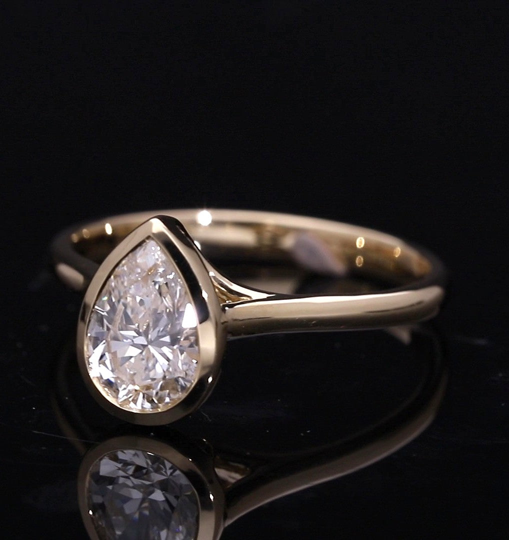 Pear Cut Lab-Grown Diamond Solitaire Ring with Full Bezel Setting