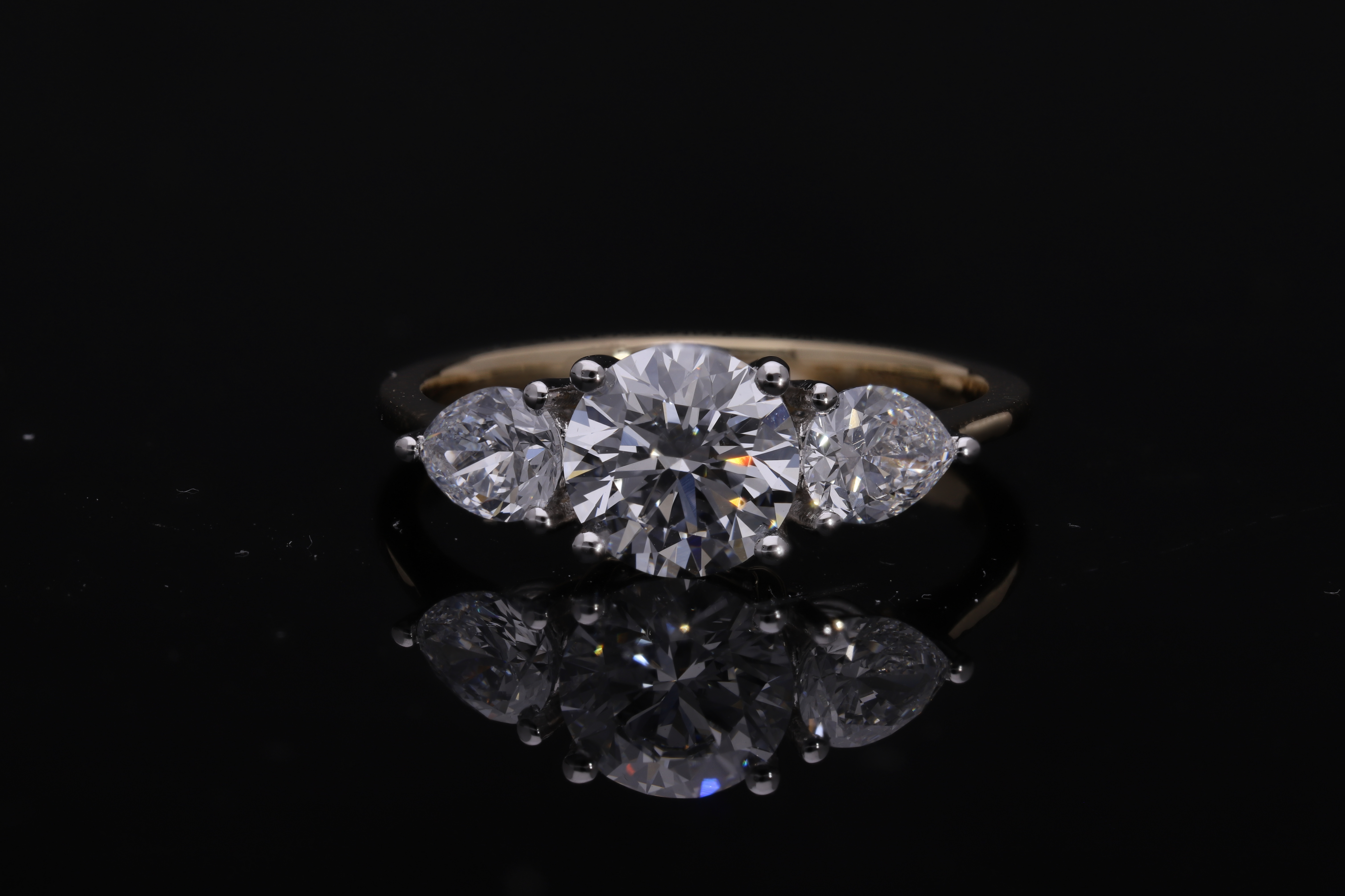 Round Brilliant cut with Pear Cut Lab grown Diamond Three Stone Engagement Ring