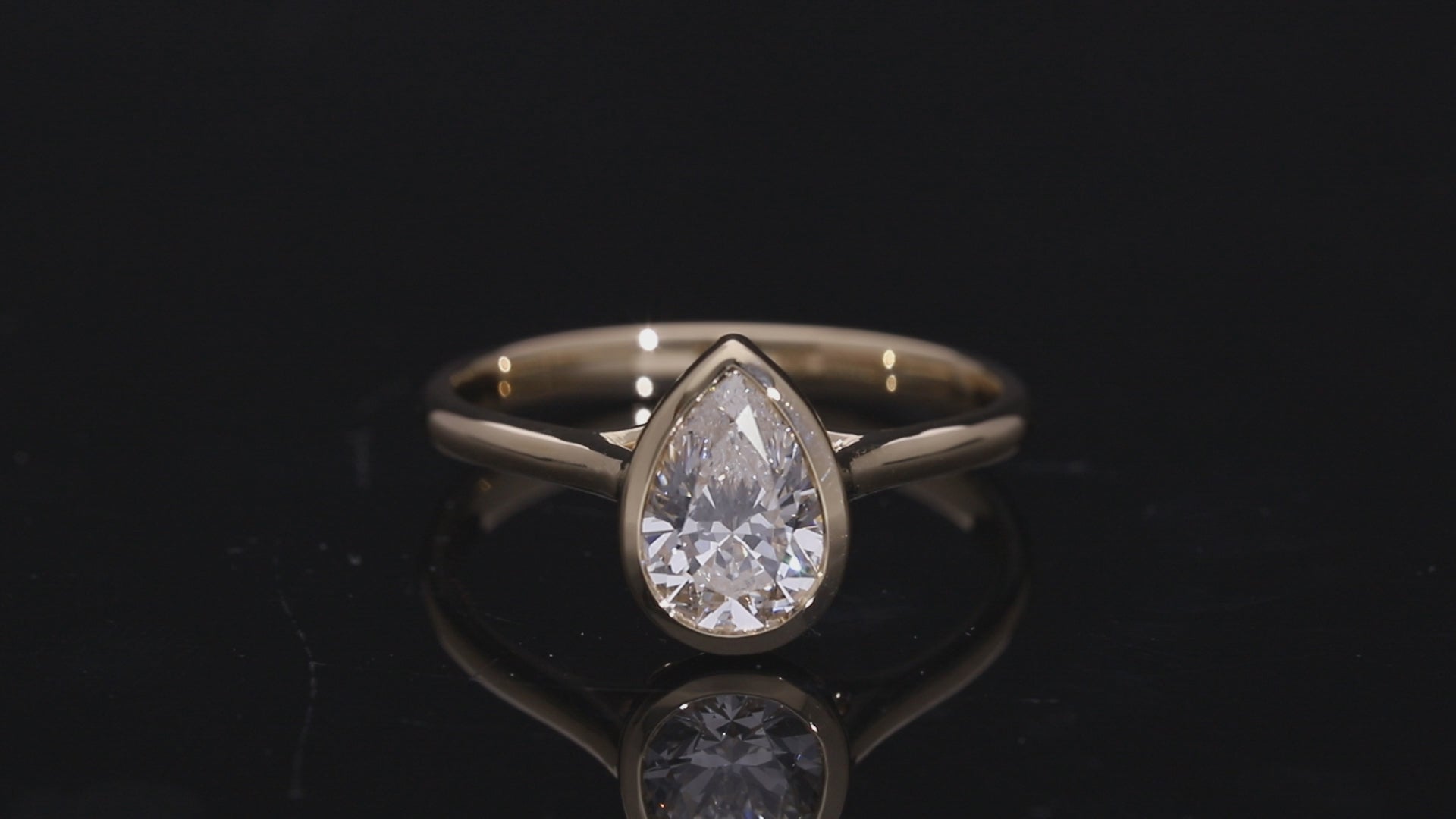 Pear Cut Lab-Grown Diamond Solitaire Ring with Full Bezel Setting